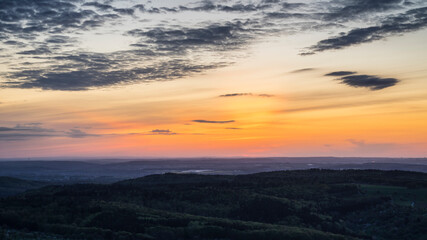 Germany, Aerial scenic view above valley of swabian alb or swabian jura with romantic orange sunset
