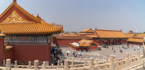 Tiananmen Square is the large square near the center of Beijing, Gate of Heavenly Peace, Forbidden City. Eaves of traditional oriental ancient buildings.