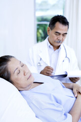 Fototapeta premium Doctor and patient in ward