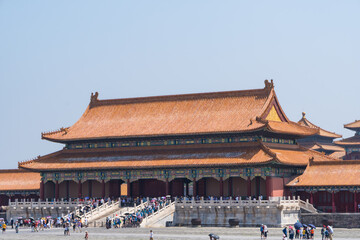 Forbidden City close to Tiananmen Square - the large square near the center of Beijing, Gate of Heavenly Peace . Eaves of traditional oriental ancient buildings.