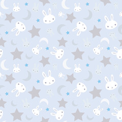 Baby boy nursery seamless pattern with white bunnies and cute rabbits and stars on light blue background.