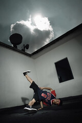 Young man breakdancing