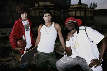 Fototapeta premium Three men posing for the camera