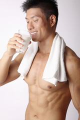 Man drinking a glass of milk