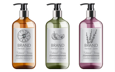 Bottles of organic shampoo with herbal care. Various plants and colors. Mint, orange and lavender - 363160434