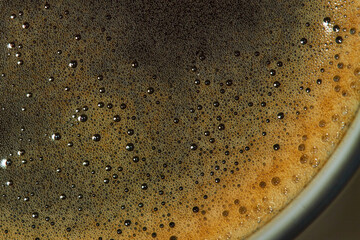 Background from coffee foam with bubbles.
