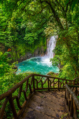 Waterfall and natural pool with turquoise water of Rio Celeste in Tenorio Volcano national park, Costa Rica. Central America.