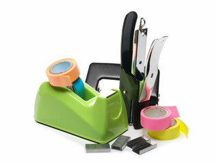 Office supplies, tape holder, paper puncher, and stapler isolated on white background