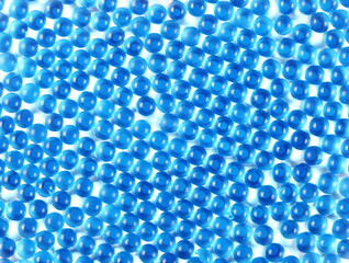 Blue translucent rubber balls background and texture