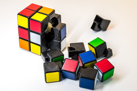 Pieces of Rubik's Cube for problem solving on white background