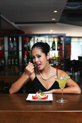 Woman enjoying her lunch at a restaurant