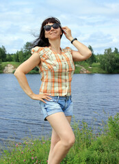 woman on a walk by the river