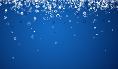 Round confetti falling on blue background.