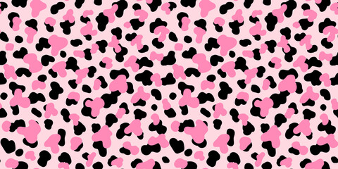 Colorful wild spotted skin or fur texture seamless pattern. Animalistic design. Vector illustration background. Pastel pink colored wallpaper.	