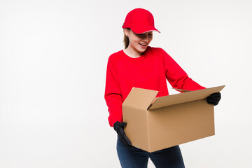 Young asian woman with delivery service worker in uniform. Woman holding box with attractive smiling isolated on white background.