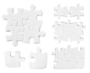 Fototapeta premium Set with jigsaw puzzle pieces on white background, top view