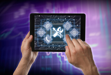 Man using tablet on color background, closeup. Technical support