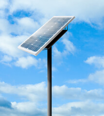 Obraz premium Modern solar panel and blue cloudy sky on background. Alternative energy source