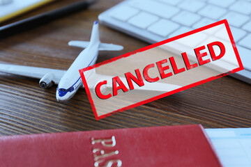 Closure of air traffic through quarantine during coronavirus outbreak. Toy airplane, passport and...