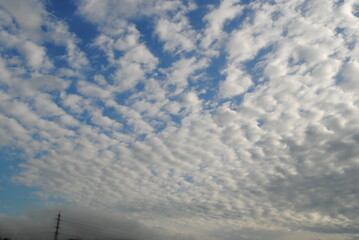 Peaceful clouds on a blue sky day