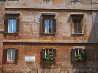 Historic orange italian facade during sunset
