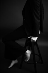 Details of body of beautiful girl, fashion and art, authentic black and white photo shoot, candid...