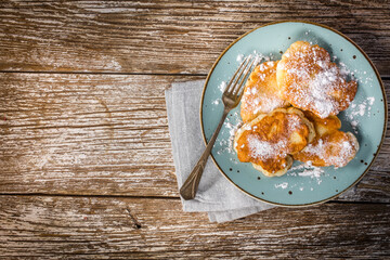 Homemade pancakes on a wooden table.