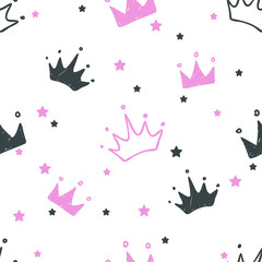 Hand drawn seamless pattern with doodle crowns. Cute baby and little princess design. Children's room wallpaper and clothes texture.