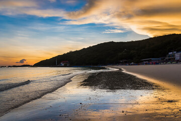 Chon Buri, Thailand - June, 28, 2020 :  Pictures of Tawaen Beach in the dawn, the sun was rising, morning sunrise  time on Koh Lan island after the outbreak of the Covid 19 virus.