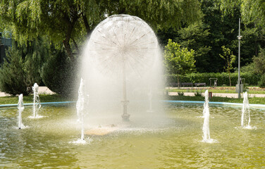 fountain in the park on a hot day