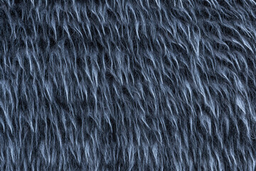 Abstract texture of gray artificial fur. Dark gray fur with a long pile.