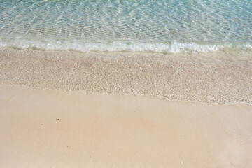 Beach and sea background, Sand and bubble, wave. Soft wave on sandy beach. Background.