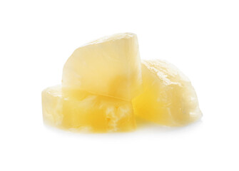 Pieces of canned pineapple isolated on white
