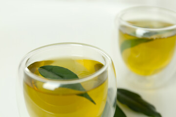 Aromatic green tea on light background, closeup