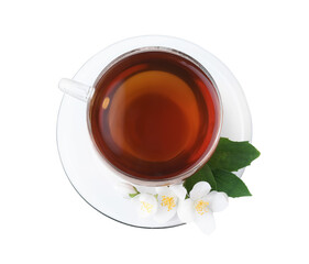 Cup of tea and fresh jasmine flowers isolated on white, top view