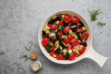 Stewed vegetables in ceramic pan. Ratatouille traditional french cuisine