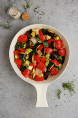 Stewed vegetables in ceramic pan. Ratatouille traditional french cuisine