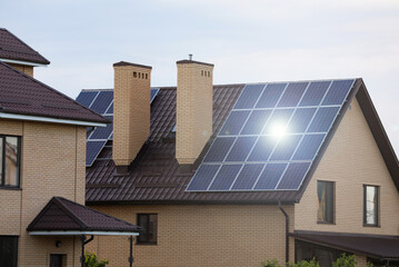 Fototapeta premium House with installed solar panels on roof