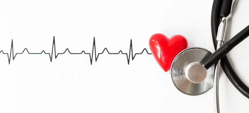 Examine the heart to prevent heart disease. Heart sign, cardiogram, stethoscope on white background top view