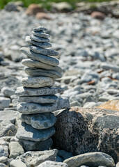 beautiful white stone piles by the sea, these objects were built by travelers, Saaremaa Island, Estonia