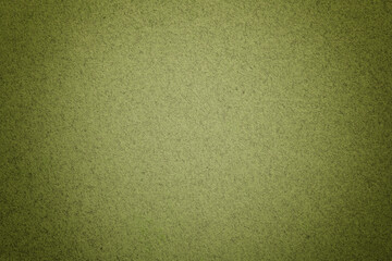 Texture of vintage light green paper background with matte vignette. Structure of olive kraft...