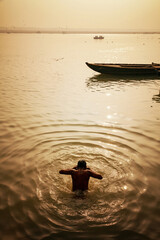Pilgrims bathing at River Ganga, Varanasi.
