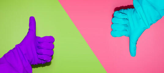 Thumbs-up and thumbs-down signs. Positive and negative answer. Usage of protective glove to prevent infection. Hand gesture of agreement and disagreement. 