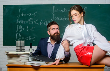 Resist temptation. Sexual temptation at workplace. Teacher and student flirting. Sexual...