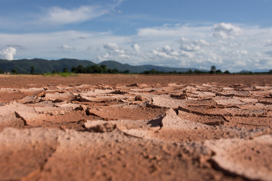 Surface Level Of Barren Land Against Sky