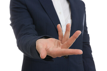 Woman showing something against white background, focus on hand