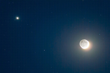 Naklejka na ściany i meble huge full moon shining on a night starry sky, outdoor natural astronomy background