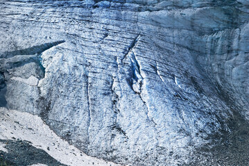 closeup mountain glacier, mount backbone in a snow and ice