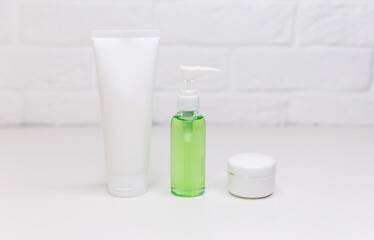 Fototapeta na wymiar Moisturizing cream, soap, shampoo, tonic, face and body skin care