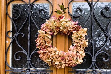 advent wreath on a door in a swiss village